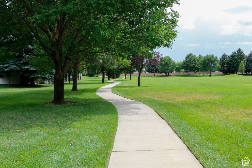 View of home\'s community featuring a lawn