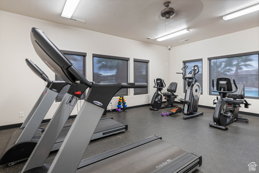 Gym featuring ceiling fan