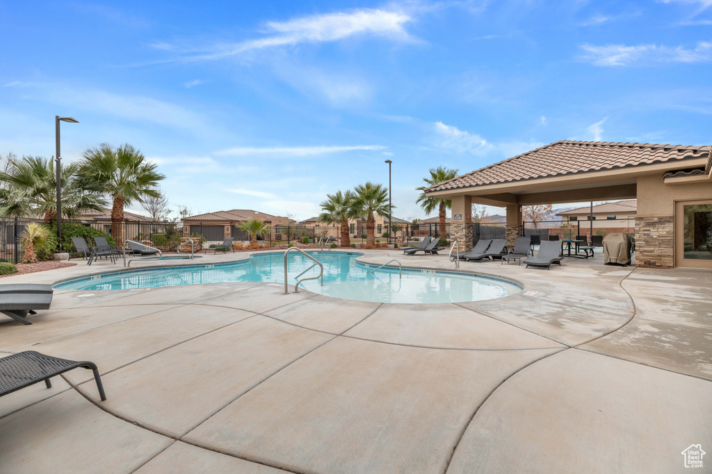 View of swimming pool featuring a patio area