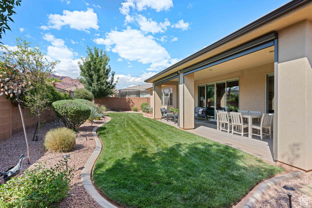 View of yard featuring a patio area