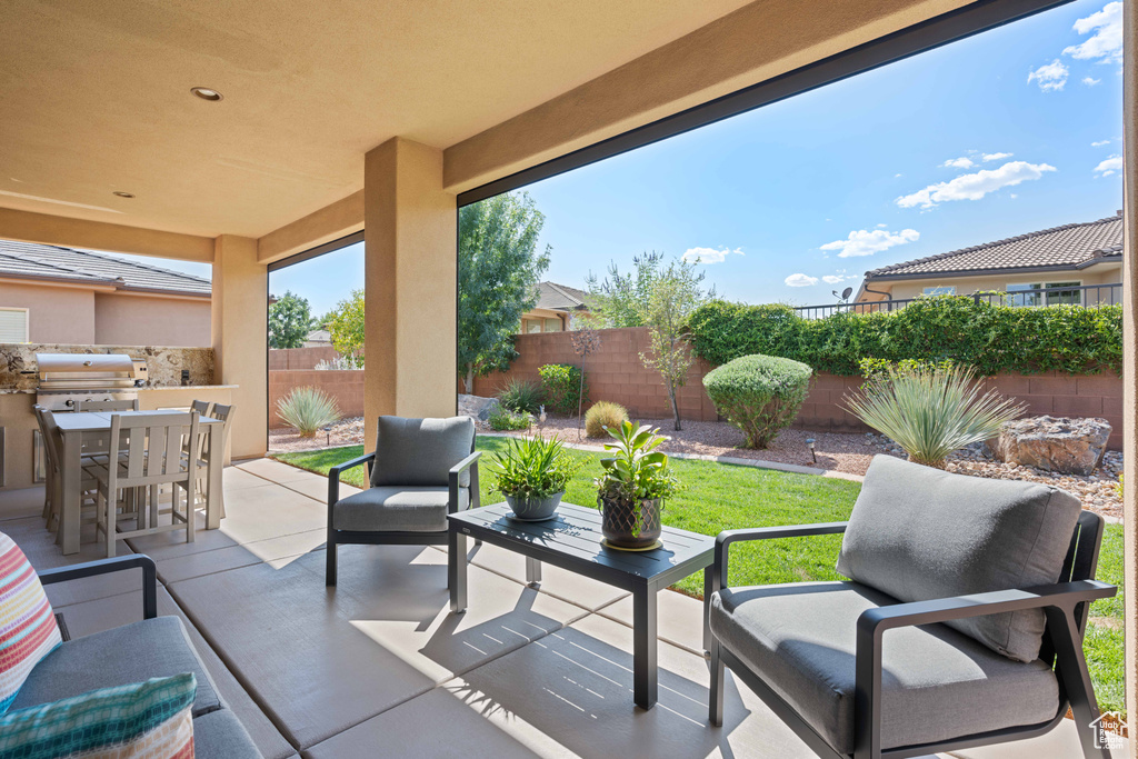 View of patio / terrace featuring an outdoor hangout area and grilling area