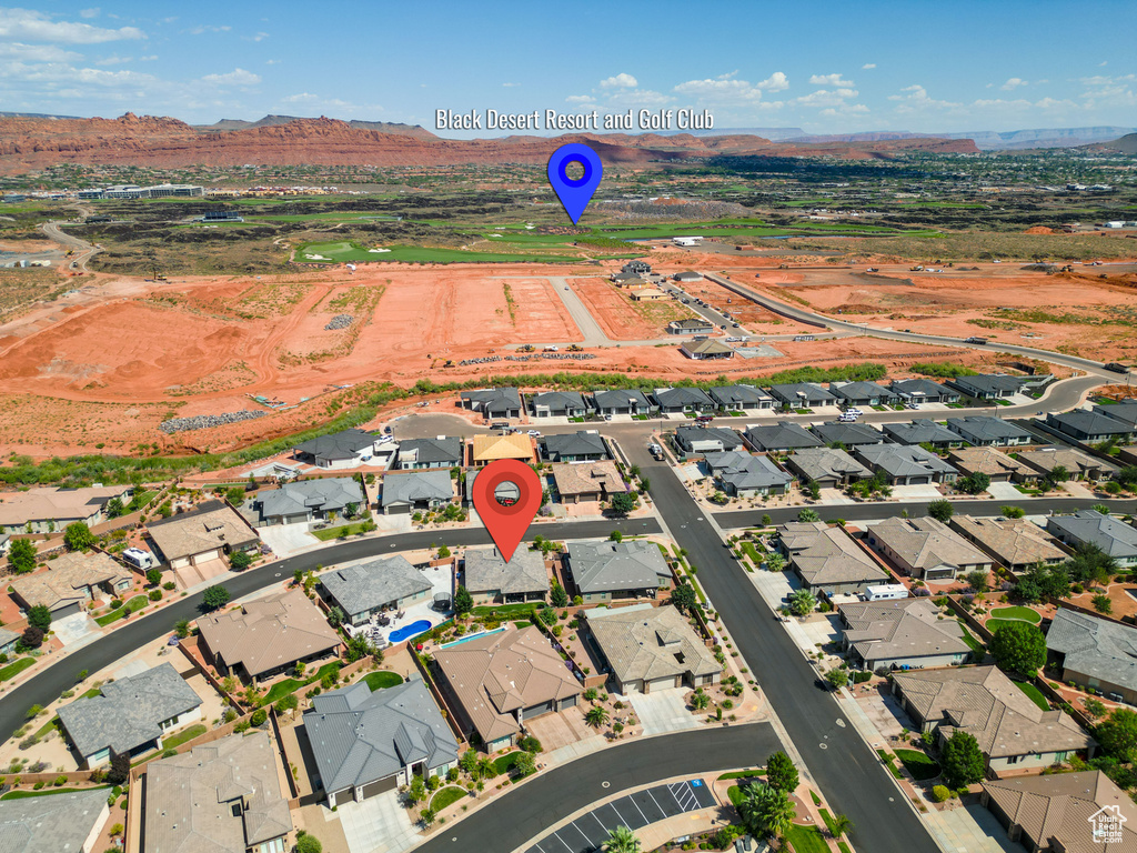 Birds eye view of property featuring a mountain view