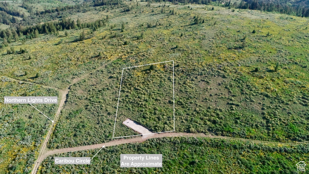 Aerial overview of property's location with property parcel outlined