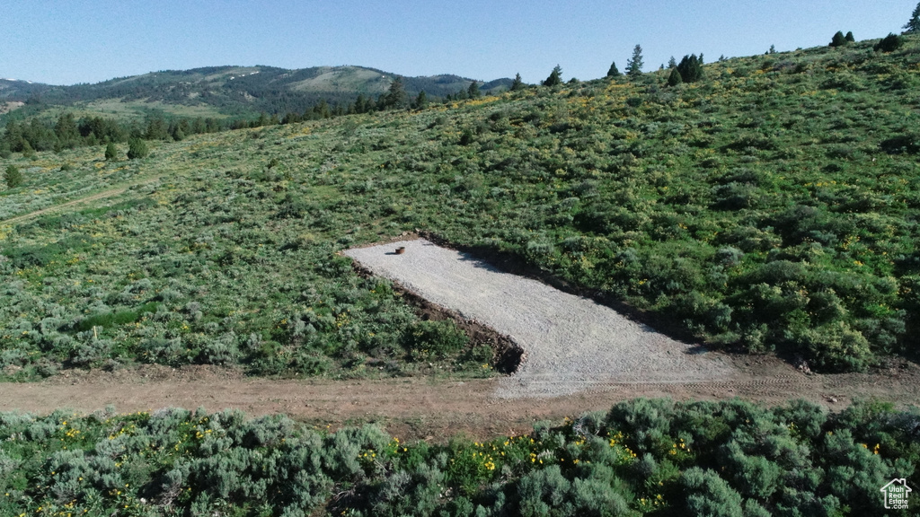 View of storm shelter with a mountain view