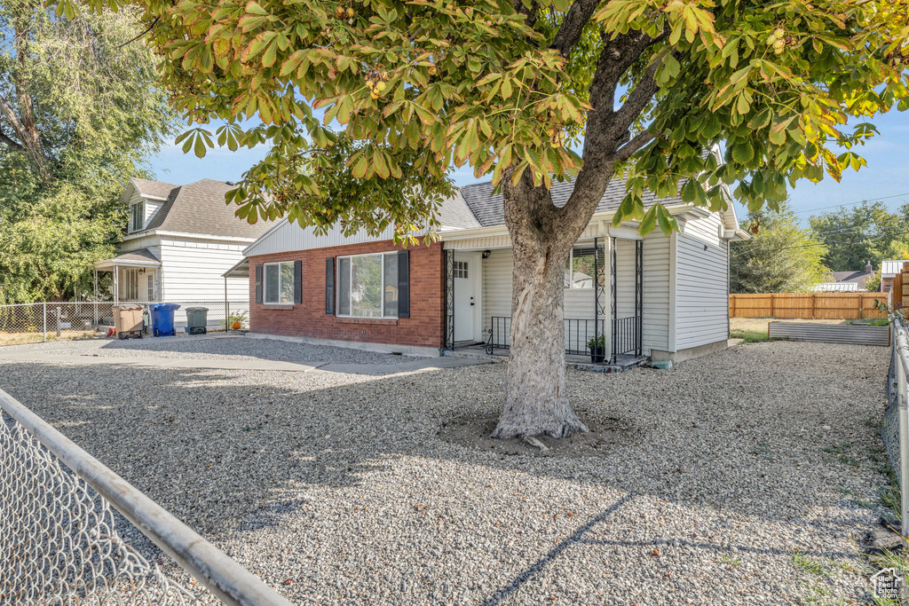 View of front of home with a patio