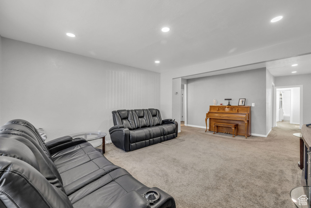 Living room featuring light carpet