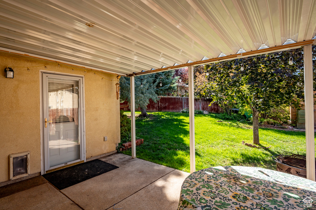 View of yard with a patio