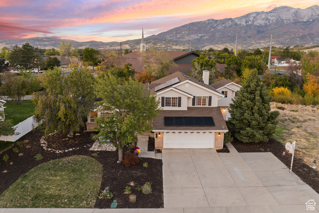 Aerial view at dusk with a mountain view