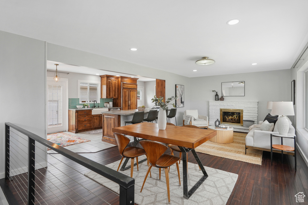 Dining space with wood-type flooring