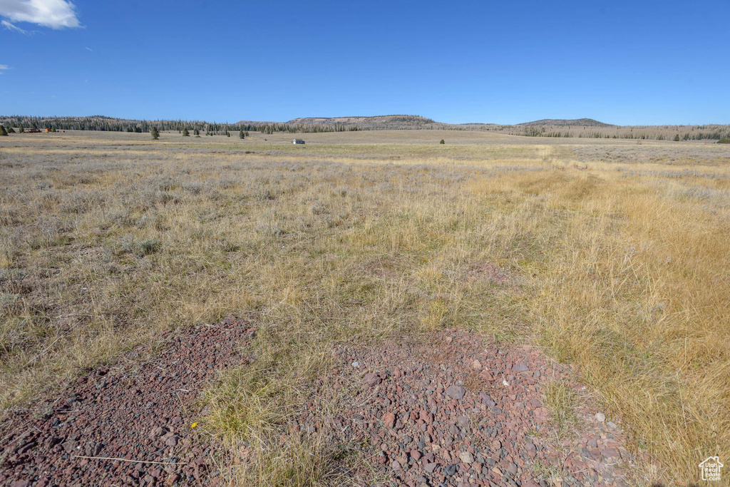 Property view of mountains featuring a rural view