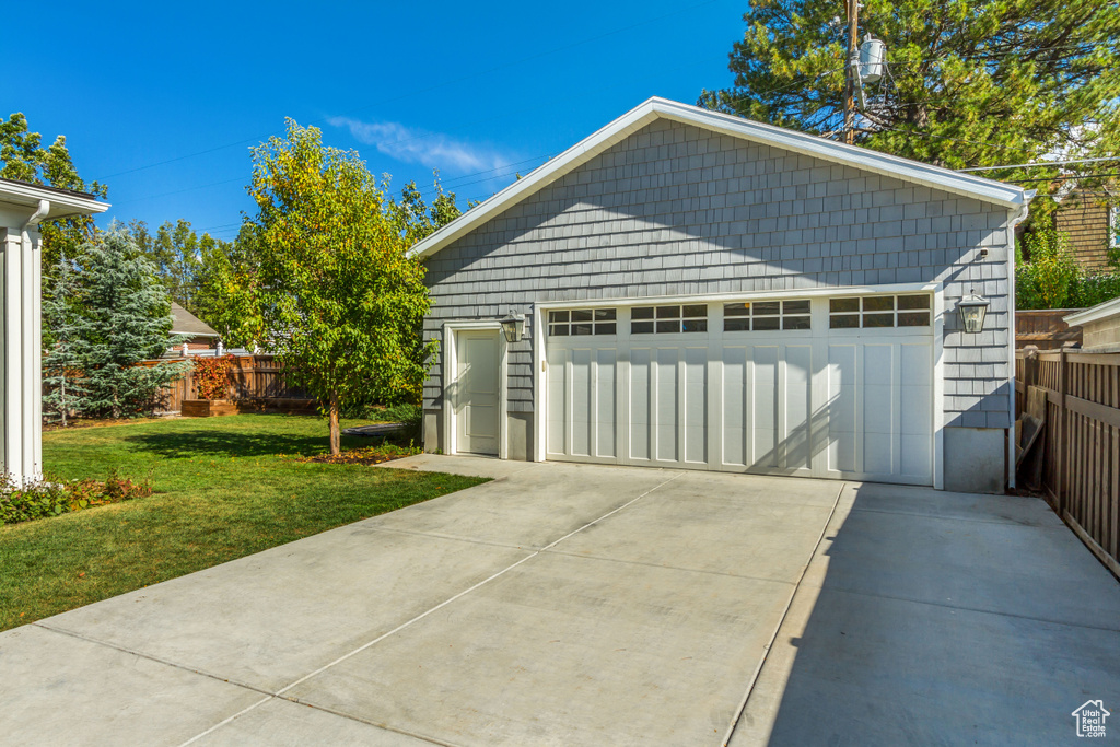 Garage with a lawn