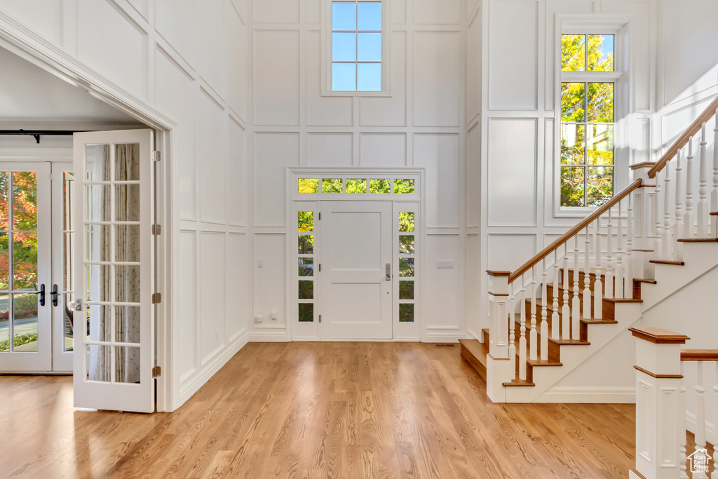 Foyer entrance featuring light hardwood / wood-style flooring