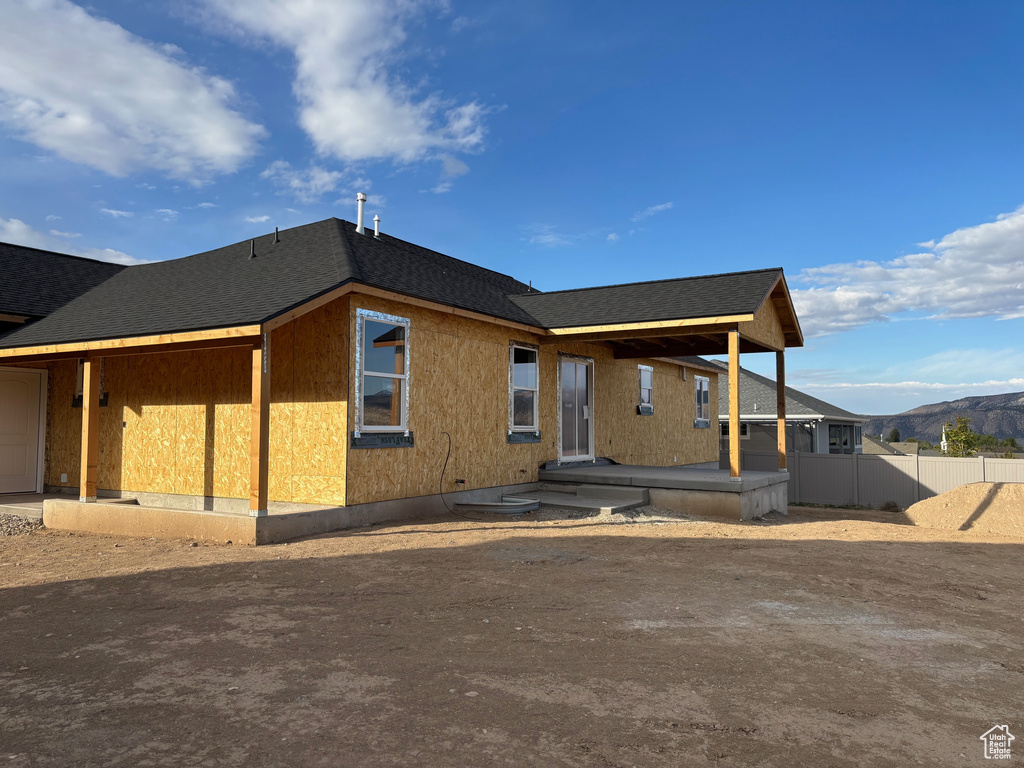 View of front of property with a mountain view