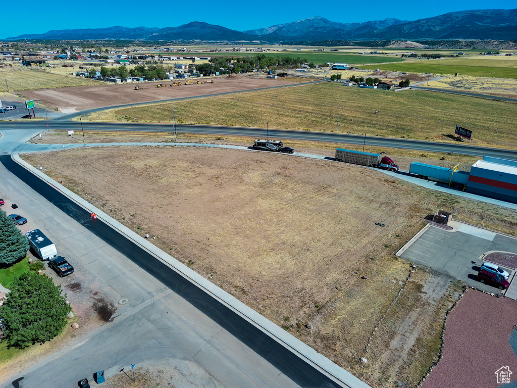 Drone / aerial view featuring a mountain view and a rural view