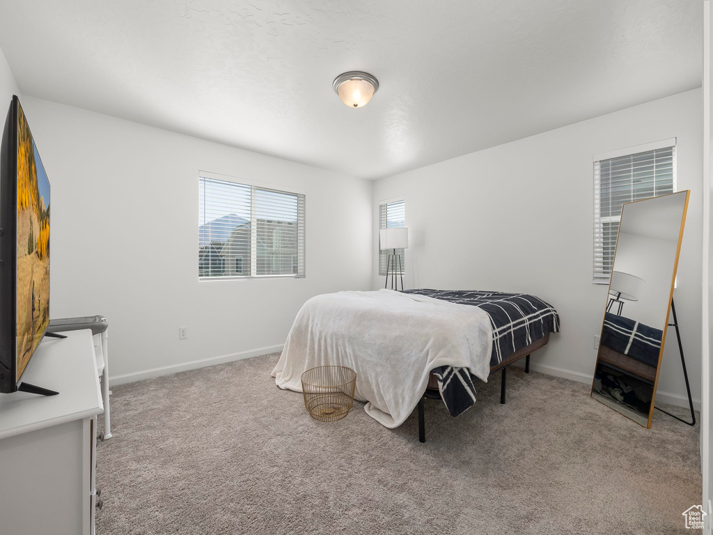 View of carpeted bedroom