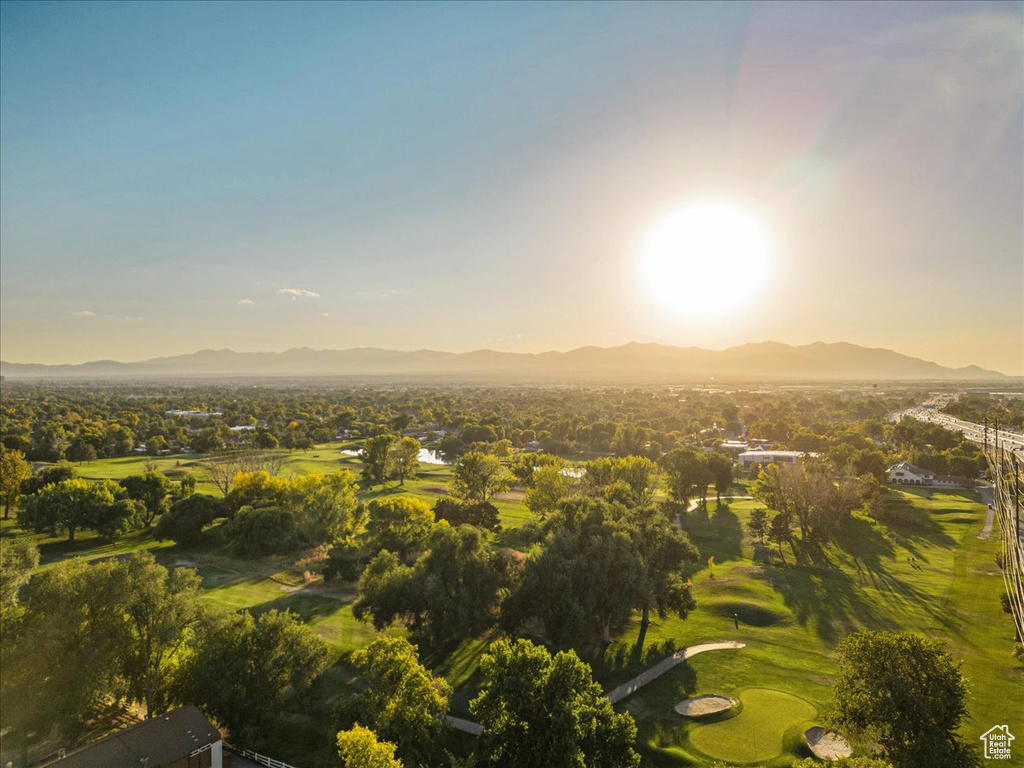 Aerial view at dusk featuring a mountain view