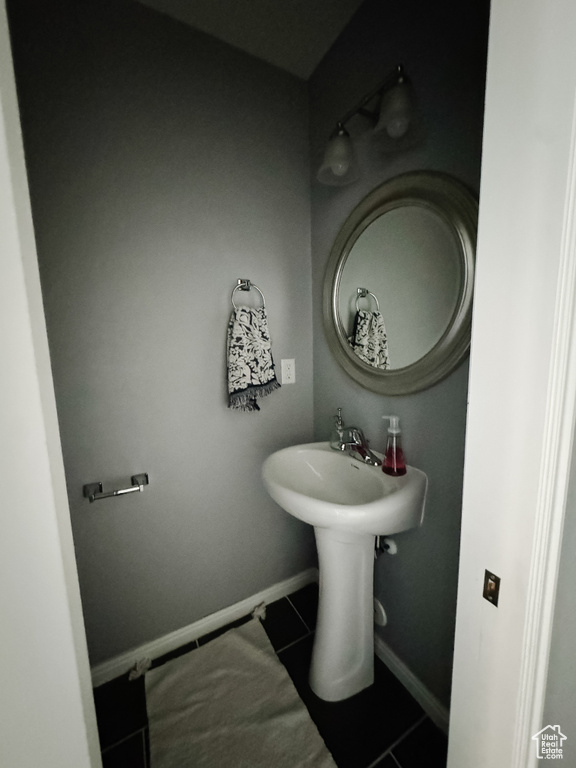 Bathroom with tile patterned floors