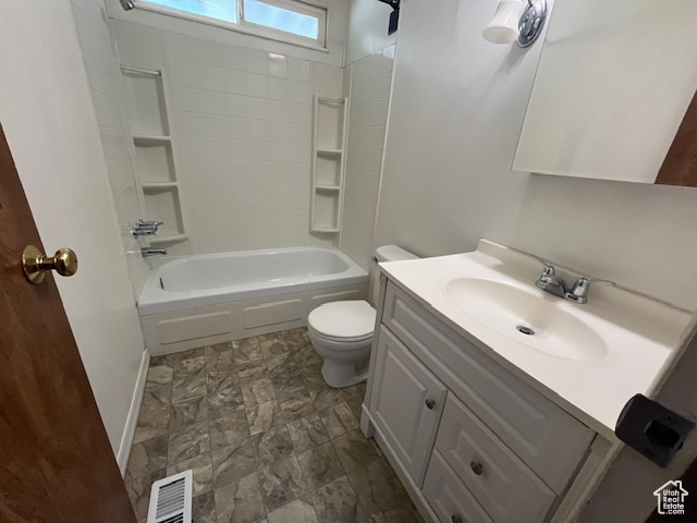 Full bathroom featuring shower / bathing tub combination, vanity, and toilet