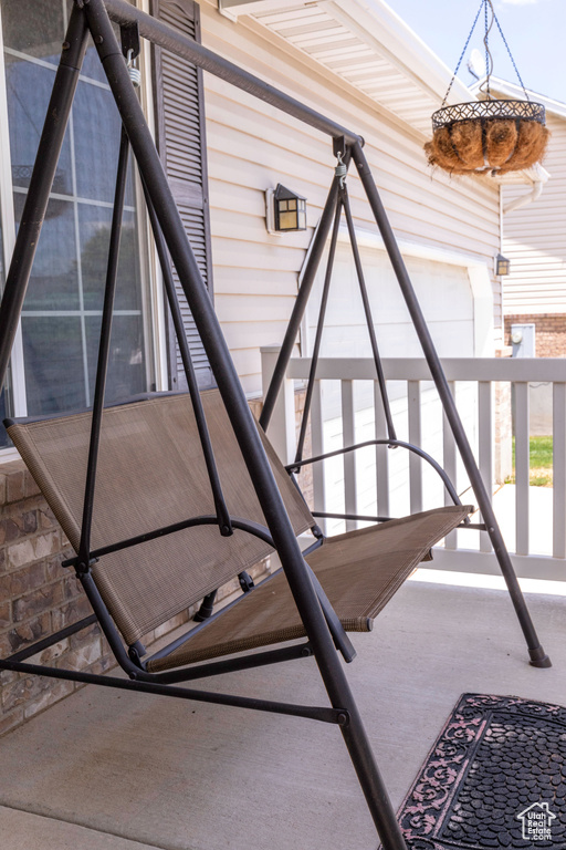 View of patio featuring a garage