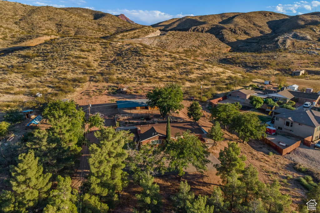 Birds eye view of property with a mountain view