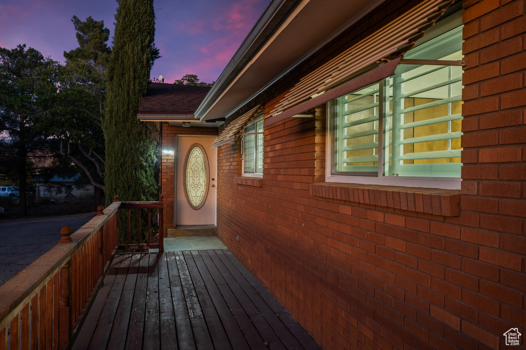 View of deck at dusk