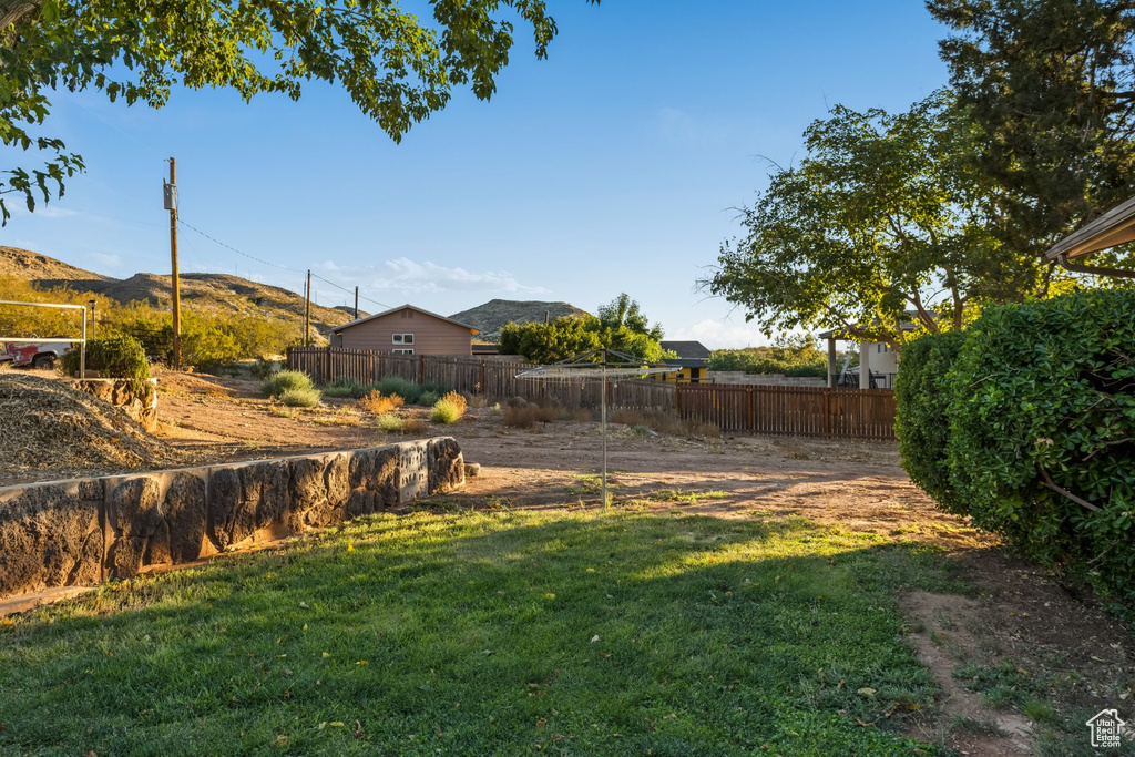 View of yard with a mountain view