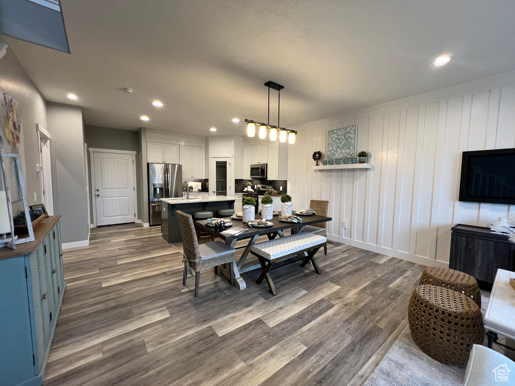 Dining space featuring hardwood / wood-style floors