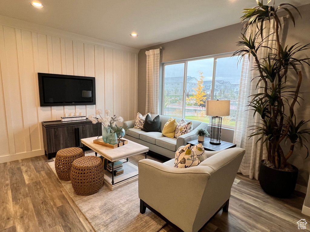 Living room with wood-type flooring