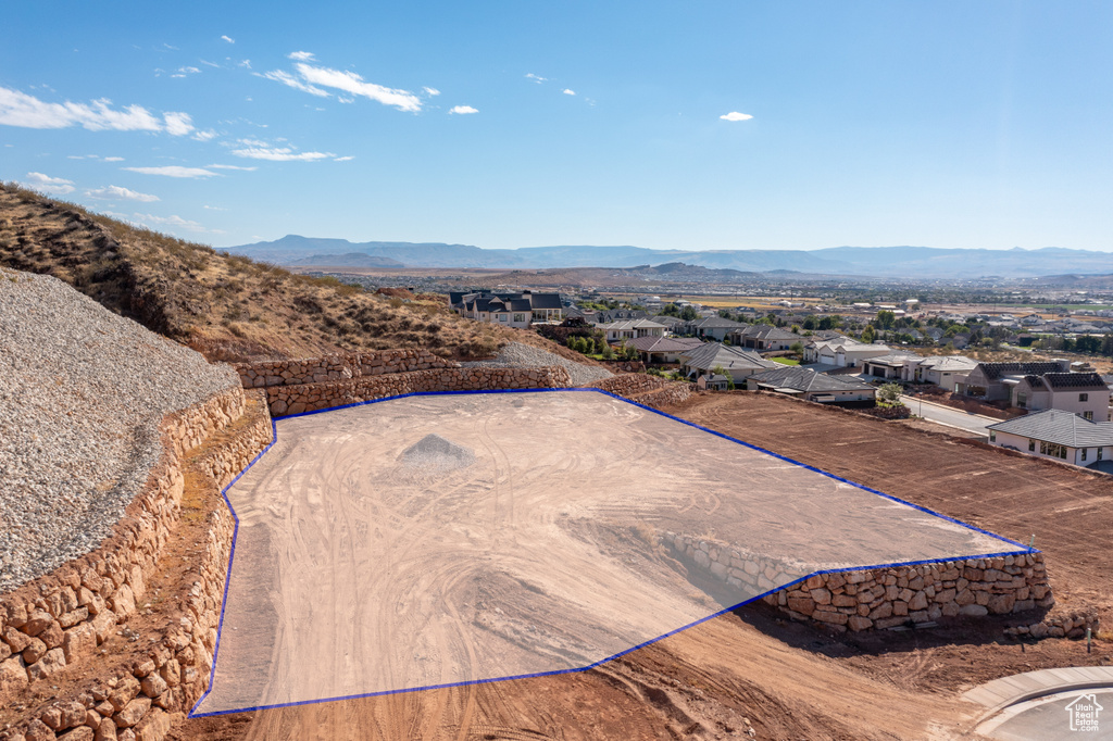 Birds eye view of property featuring a mountain view