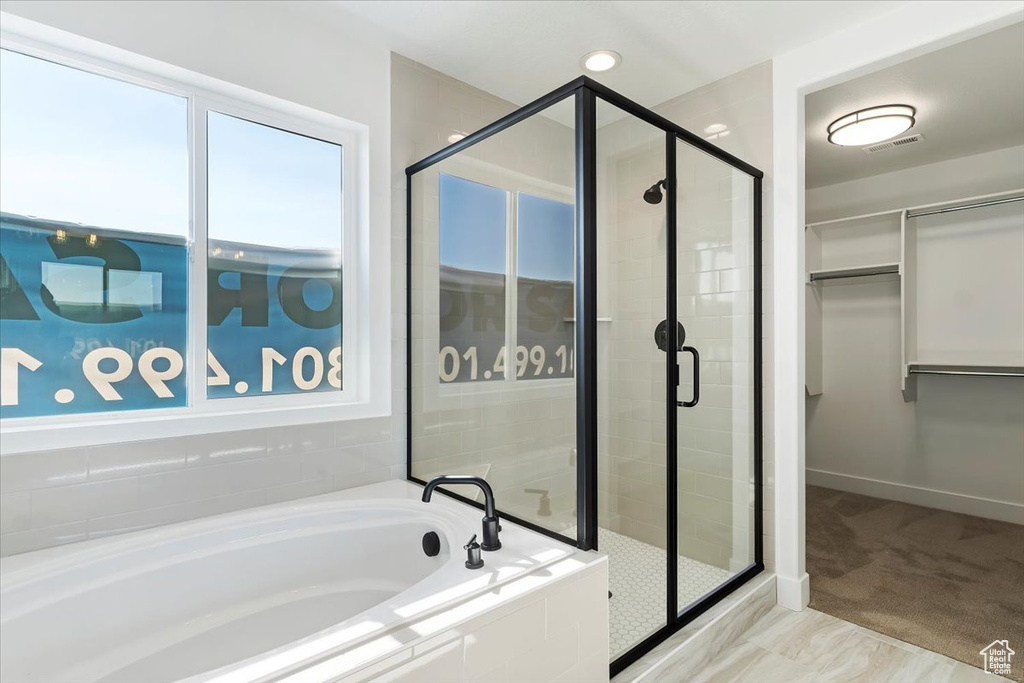 Bathroom with separate shower and tub