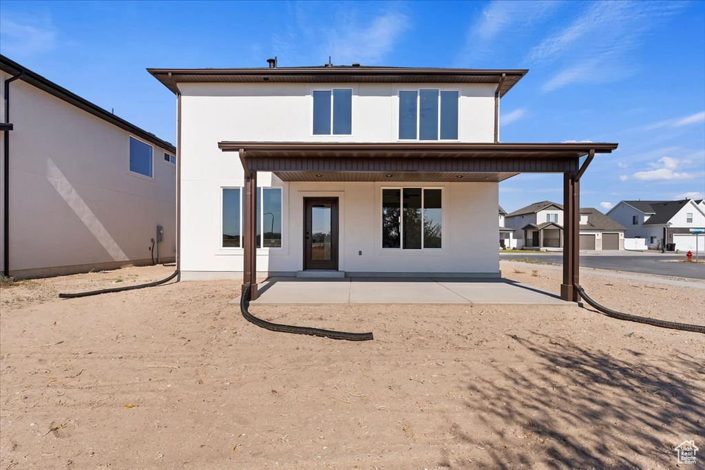 Back of property featuring a patio