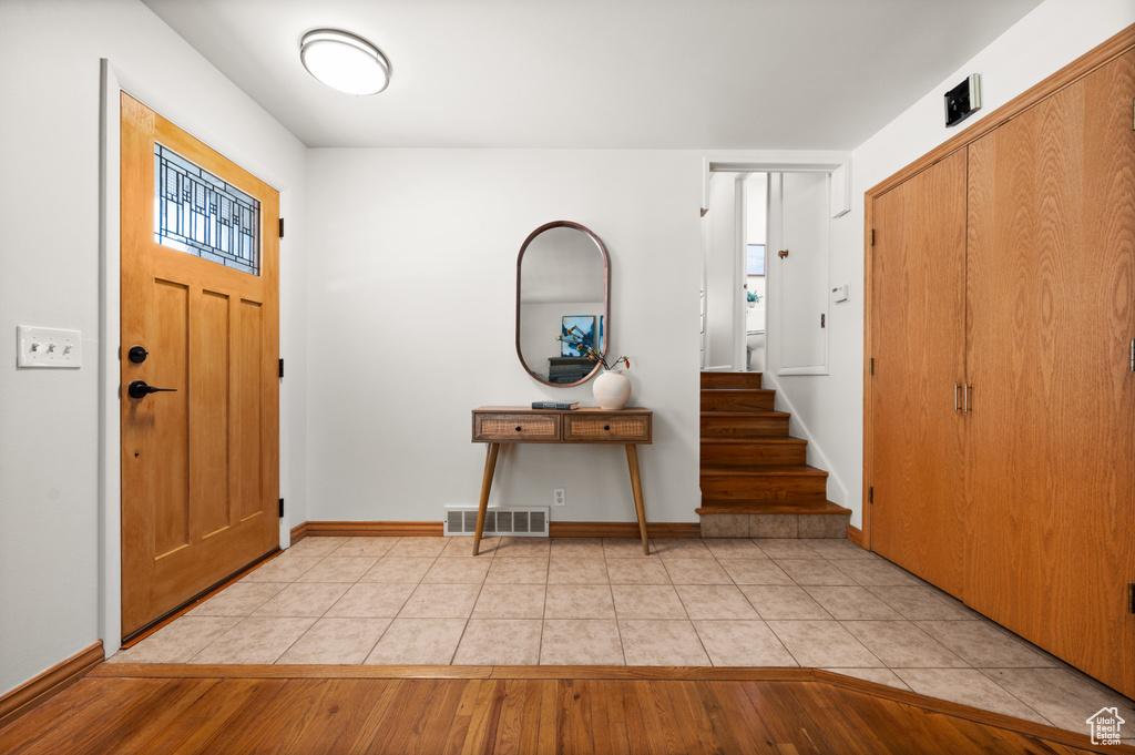 Foyer entrance featuring light wood-type flooring