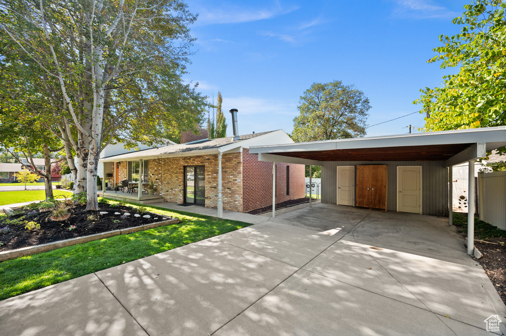 View of front of home with a carport