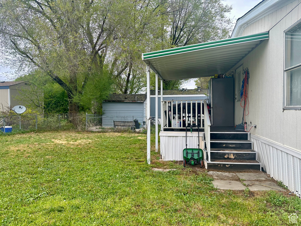 View of yard with a deck