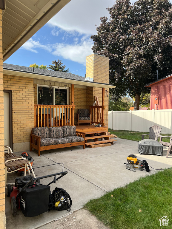 View of patio featuring a deck