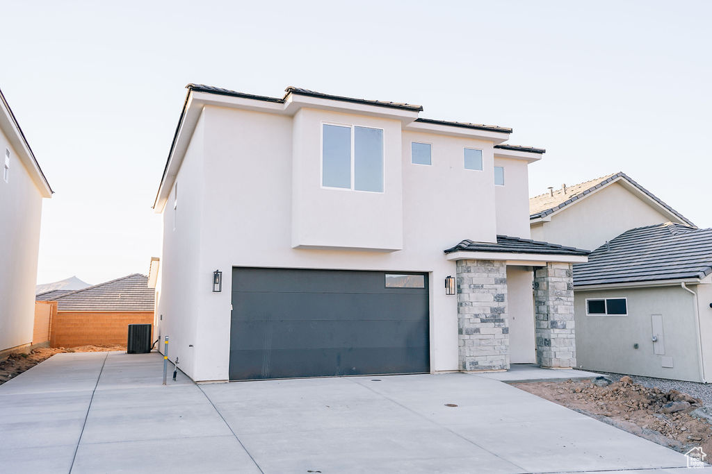 View of front facade with a garage