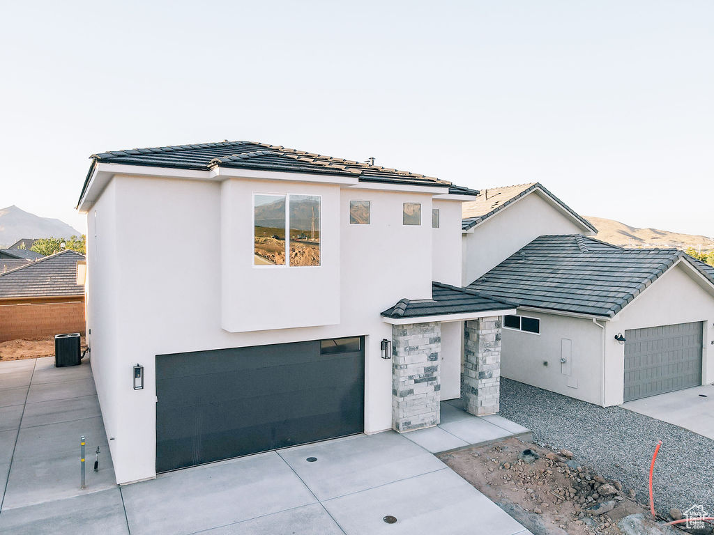 View of front of home with a mountain view