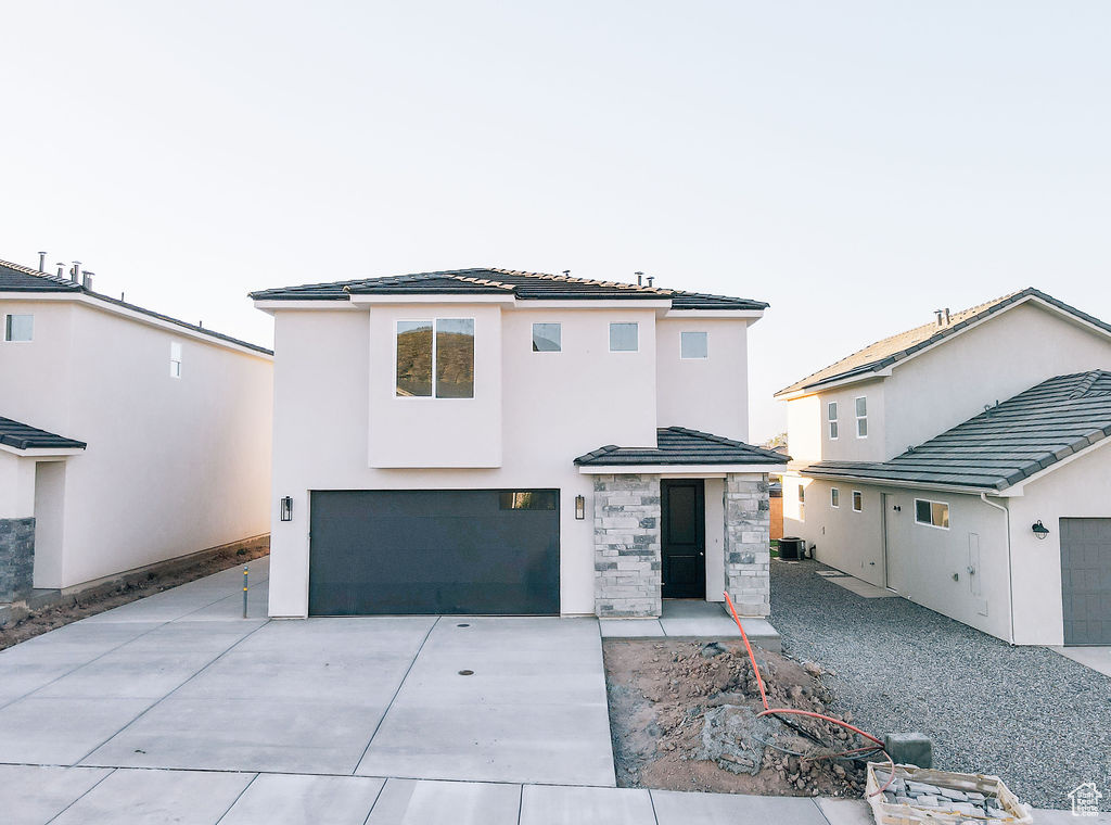 View of front of home with a patio