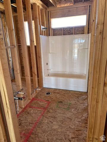 Bathroom featuring a washtub