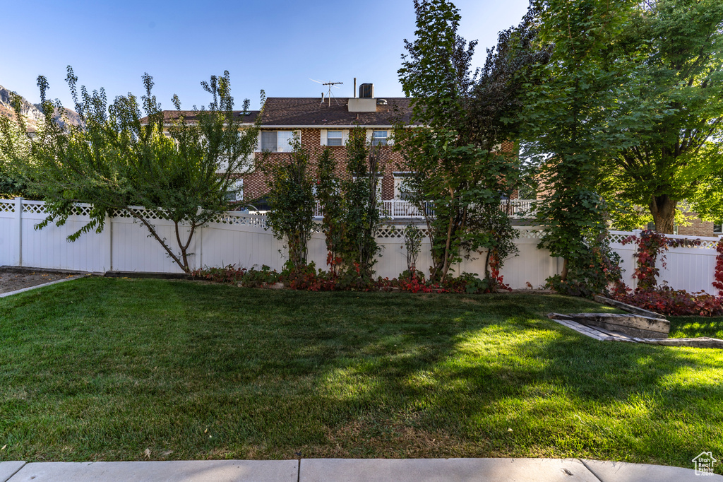 View of front of house with a front lawn