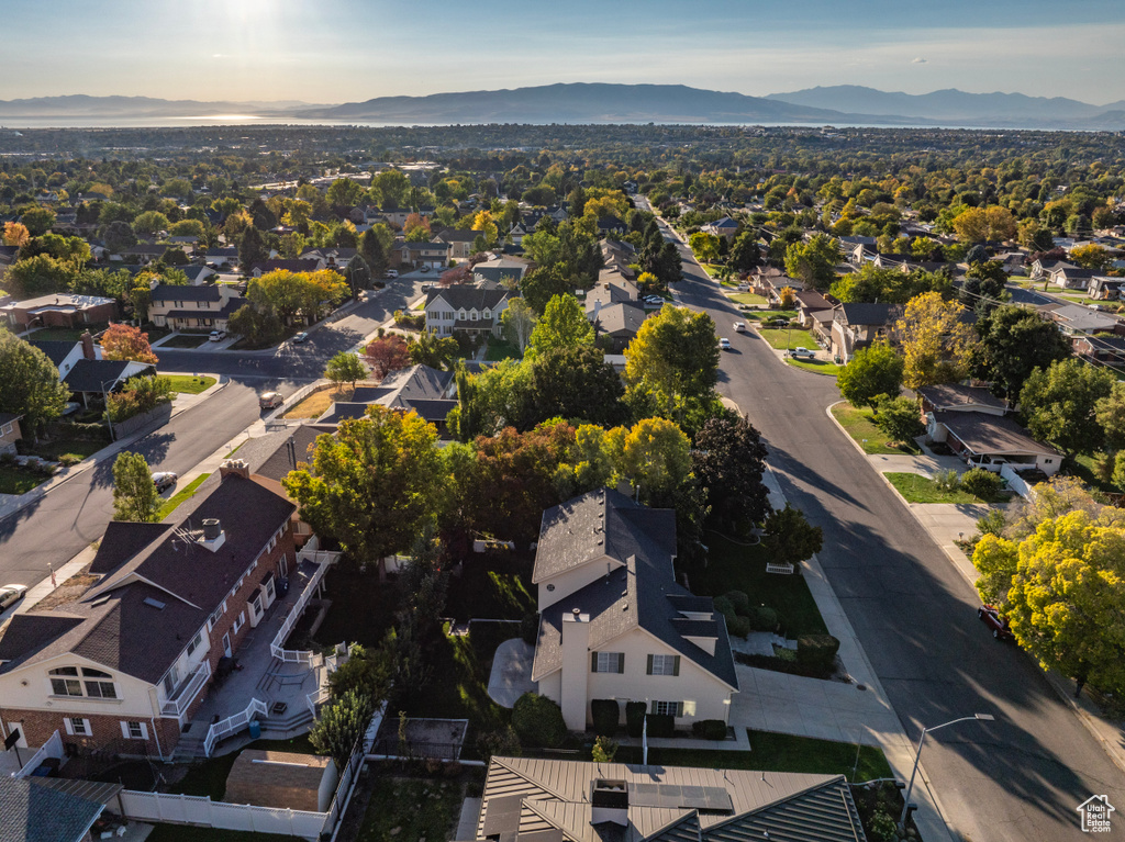 Birds eye view of property with a mountain view