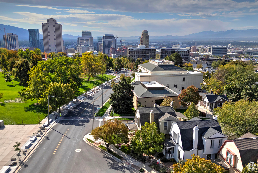 Birds eye view of property with a mountain view