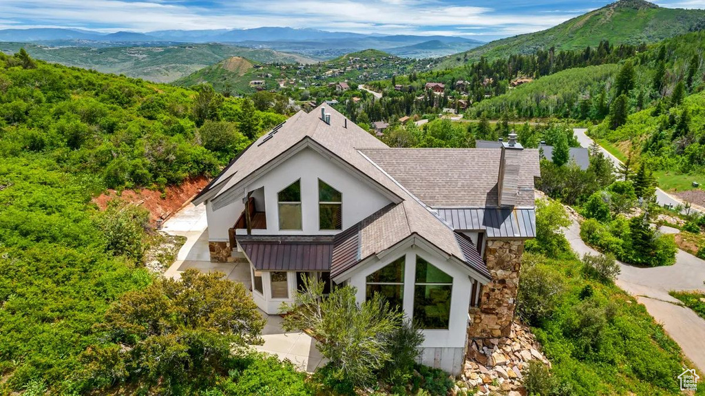 Exterior space featuring a mountain view