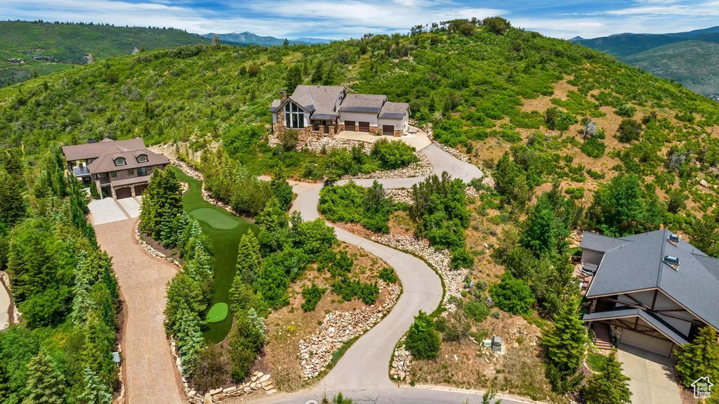 Birds eye view of property featuring a mountain view