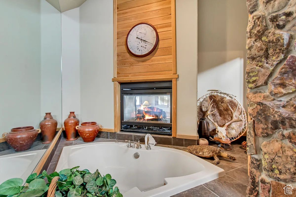 Bathroom with tiled tub