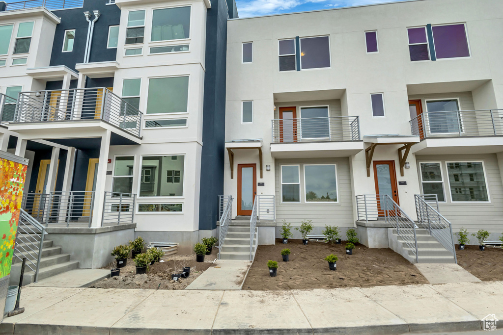 Multi unit property featuring stucco siding