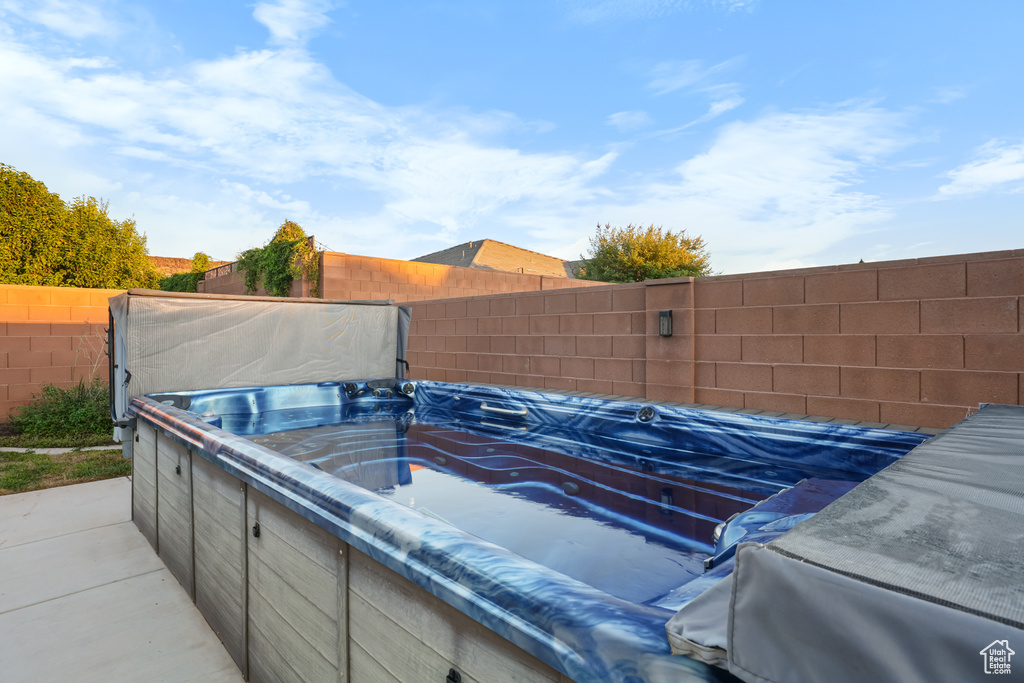 View of patio / terrace featuring a hot tub