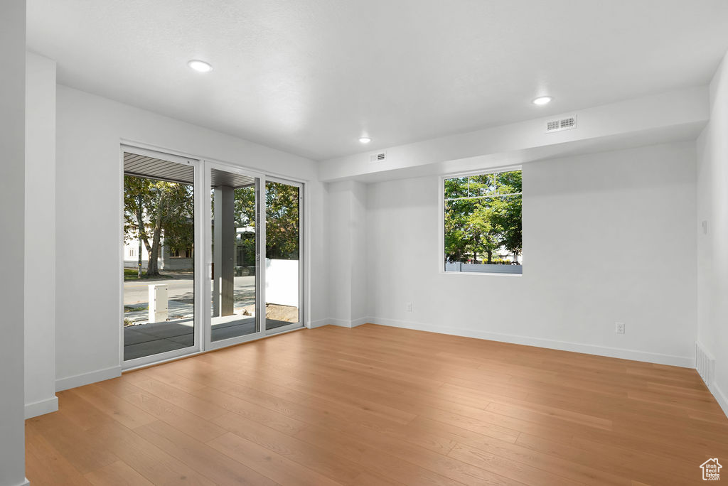 Empty room with light wood-type flooring