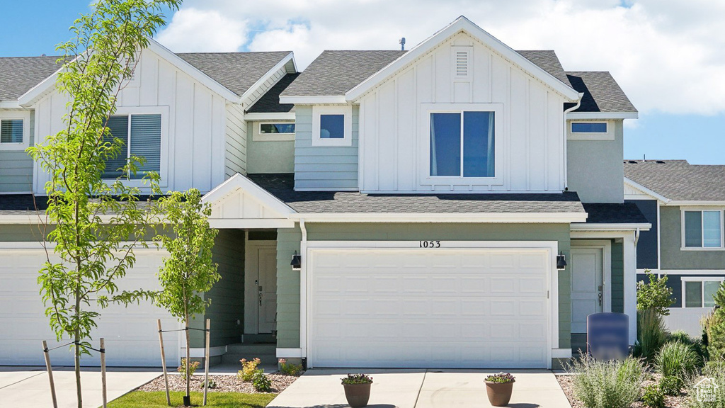 View of front of property with a garage