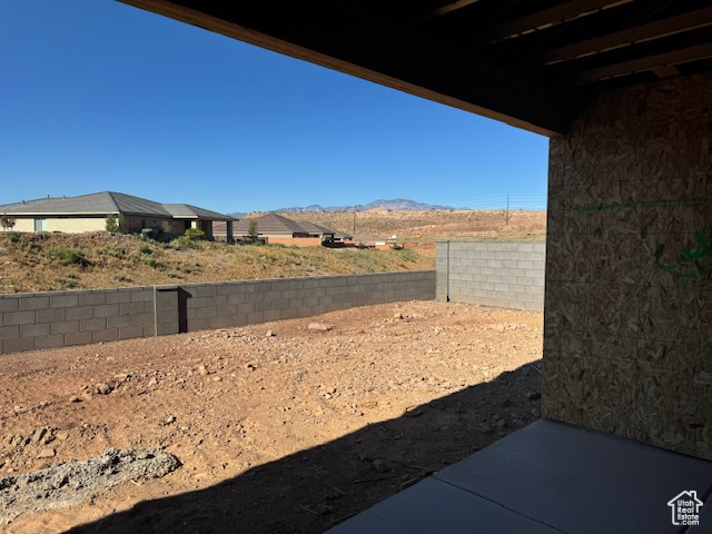 View of yard with a mountain view